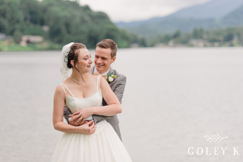 Bride and Groom Portrait with Blue Ridge Mountains and Lake 