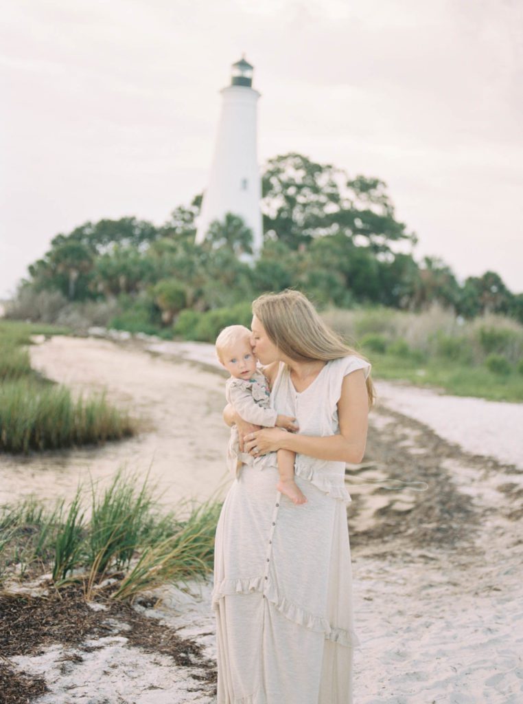 Mother and Baby with Lighthouse in background Tallahassee Family Photographer