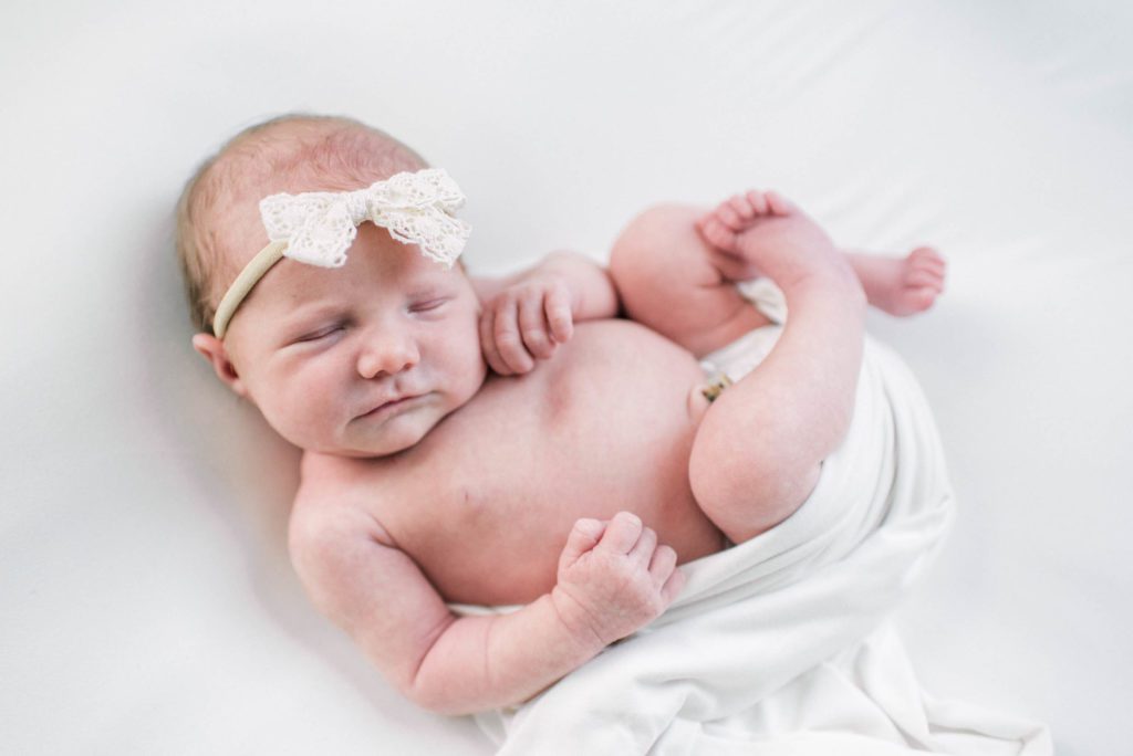 Preparing for a newborn photography baby girl photo